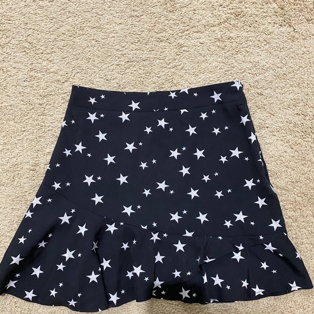 Black mini skirt with white stars